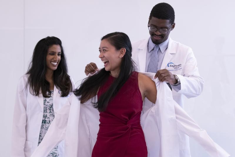 Bayhealth Family Medicine Residency Program Director Brintha Vasagar, MD, and Bayhealth Family Medicine Residency Program Clinical Pharmacy Specialist Cameron A. Golden, PharmD, BCACP, present a physician coat to Bayhealth Family Medicine Resident PGY1 Kristine Morales, DO. Shown are (l-r) Vasagar, Morales and Golden. SUBMITTED PHOTO